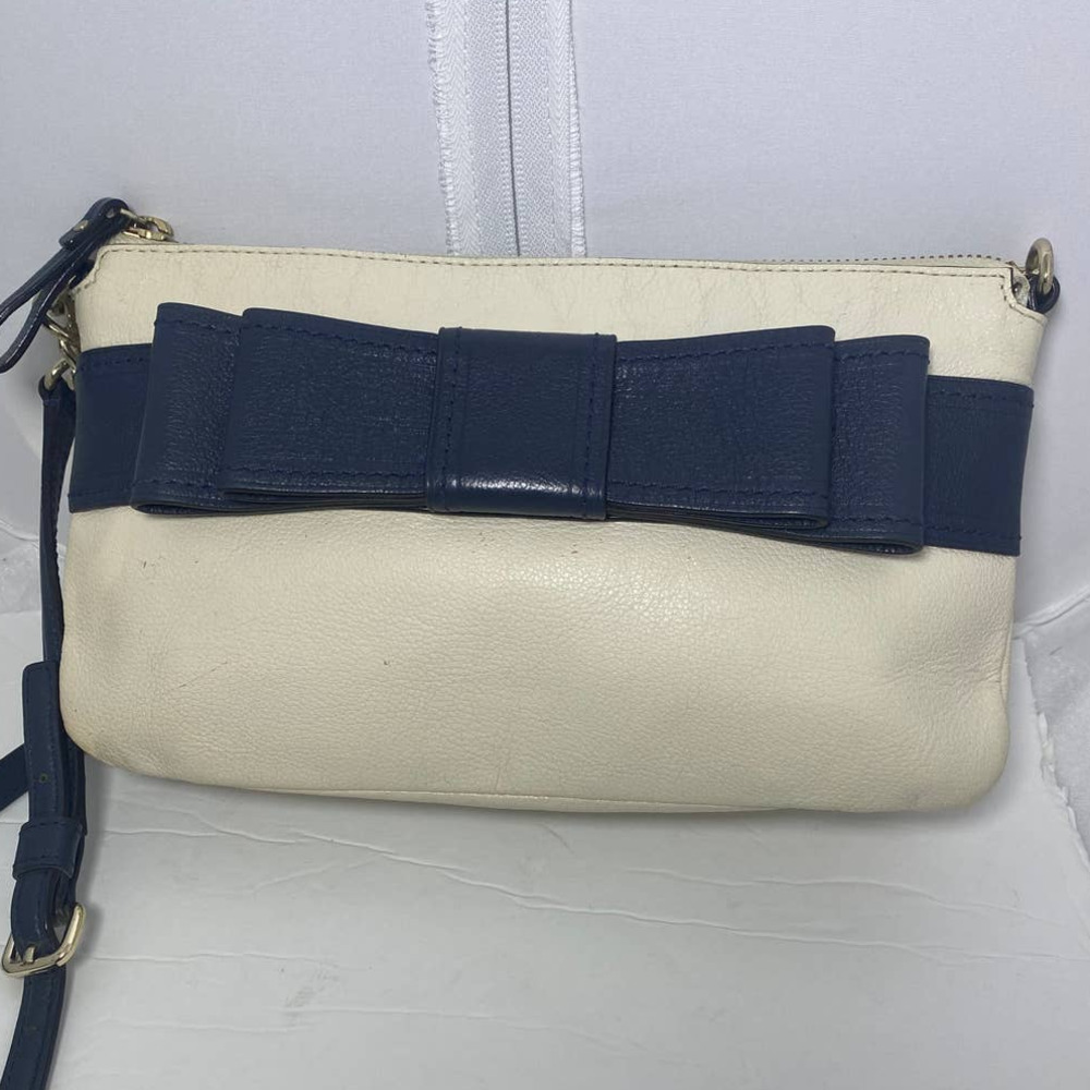 Kate Spade beige and navy crossbody with bow